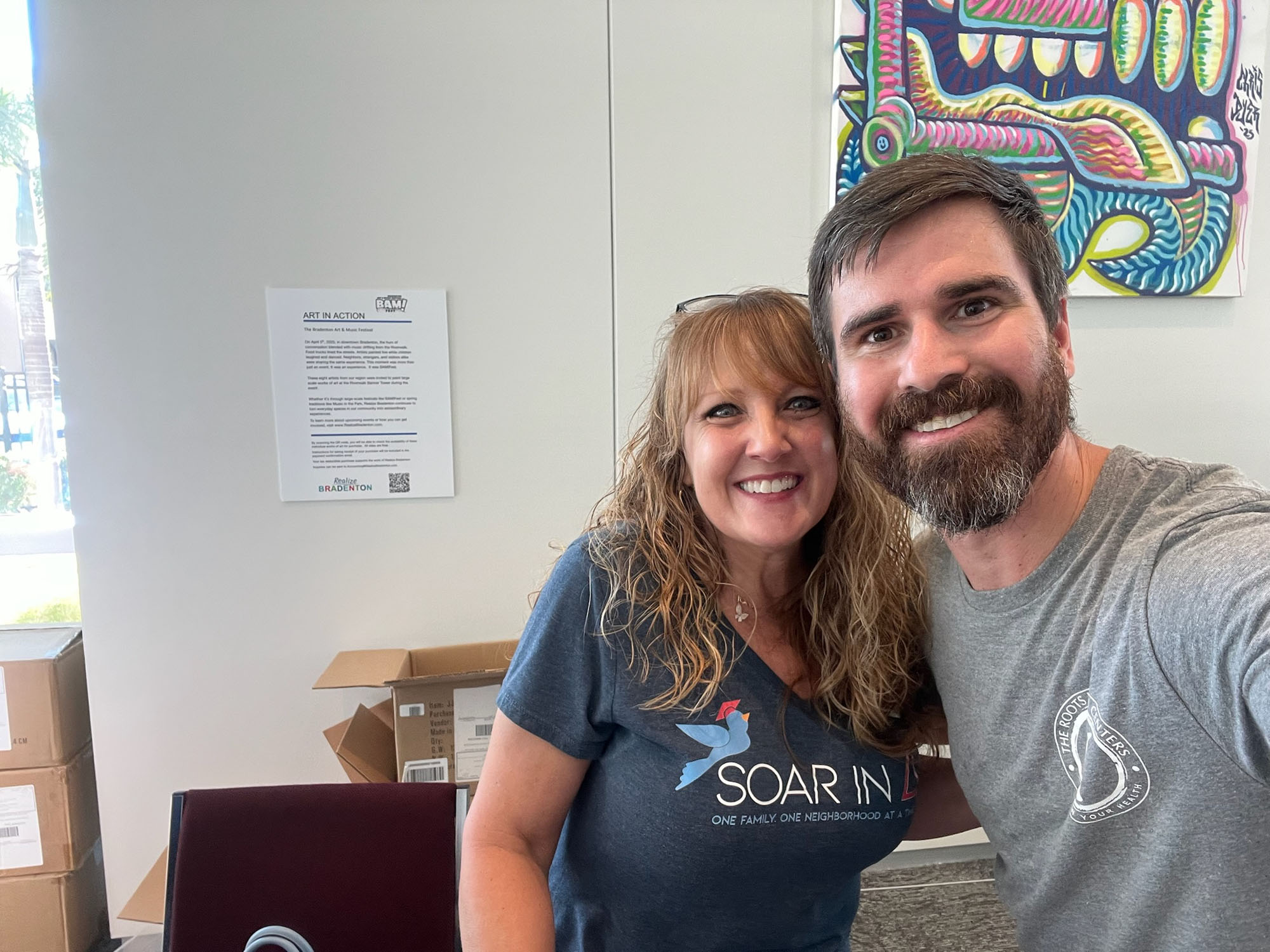 Dr. Logan Swaim with a community partner at a Lakewood Ranch event.