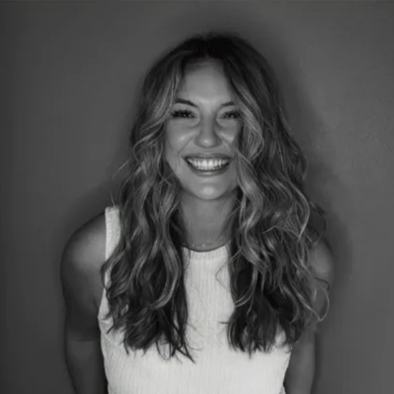 Portrait of Carly Lovato, chiropractic assistant at The Roots.